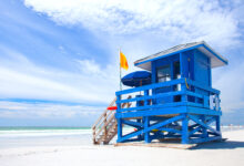 Siesta Key rescue, Banana Boat captain, Siesta Key Aqua Adventures, Frank Watrous rescue, Sarasota local hero, dog raft rescue Florida, beach float safety, Siesta Key Banana Boat, offshore wind danger, dolphin tours Siesta Key
