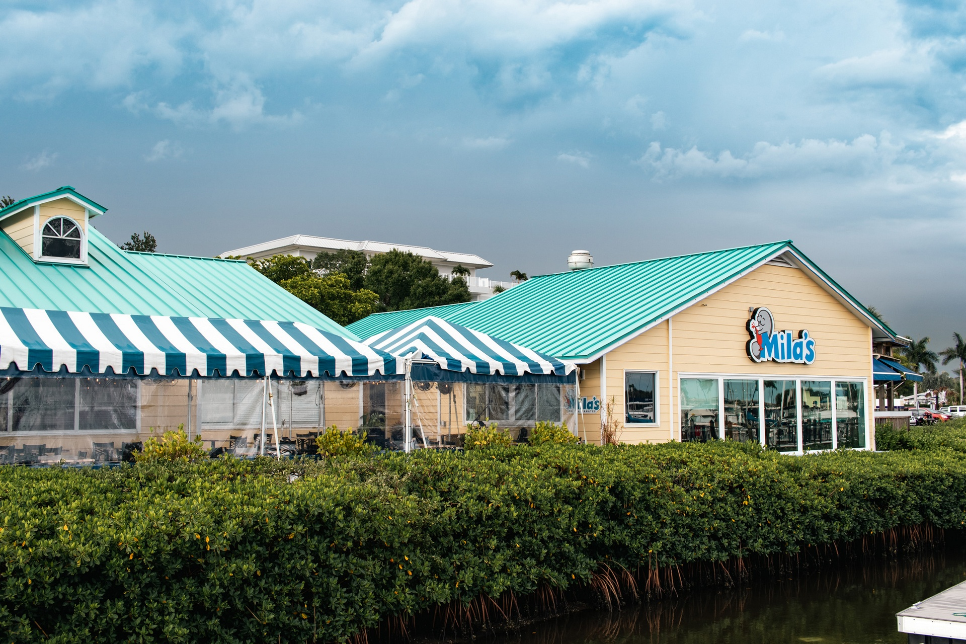 Mila's on Manatee, MILA’s on the Manatee, Palmetto waterfront dining, Palmetto Main Street restaurants, best grouper sandwich Florida, Manatee River restaurants, historic dining Palmetto, Florida Gulf Coast seafood, Palmetto food and history, waterfront restaurants Manatee County, best fish tacos Palmetto