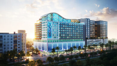 Rendering of a 13-story dual-brand AC Hotels + Moxy tower with rooftop bar and ground-floor retail at 111 N. Meridian Ave., Tampa.